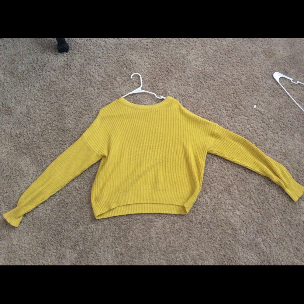 yellow sweater
